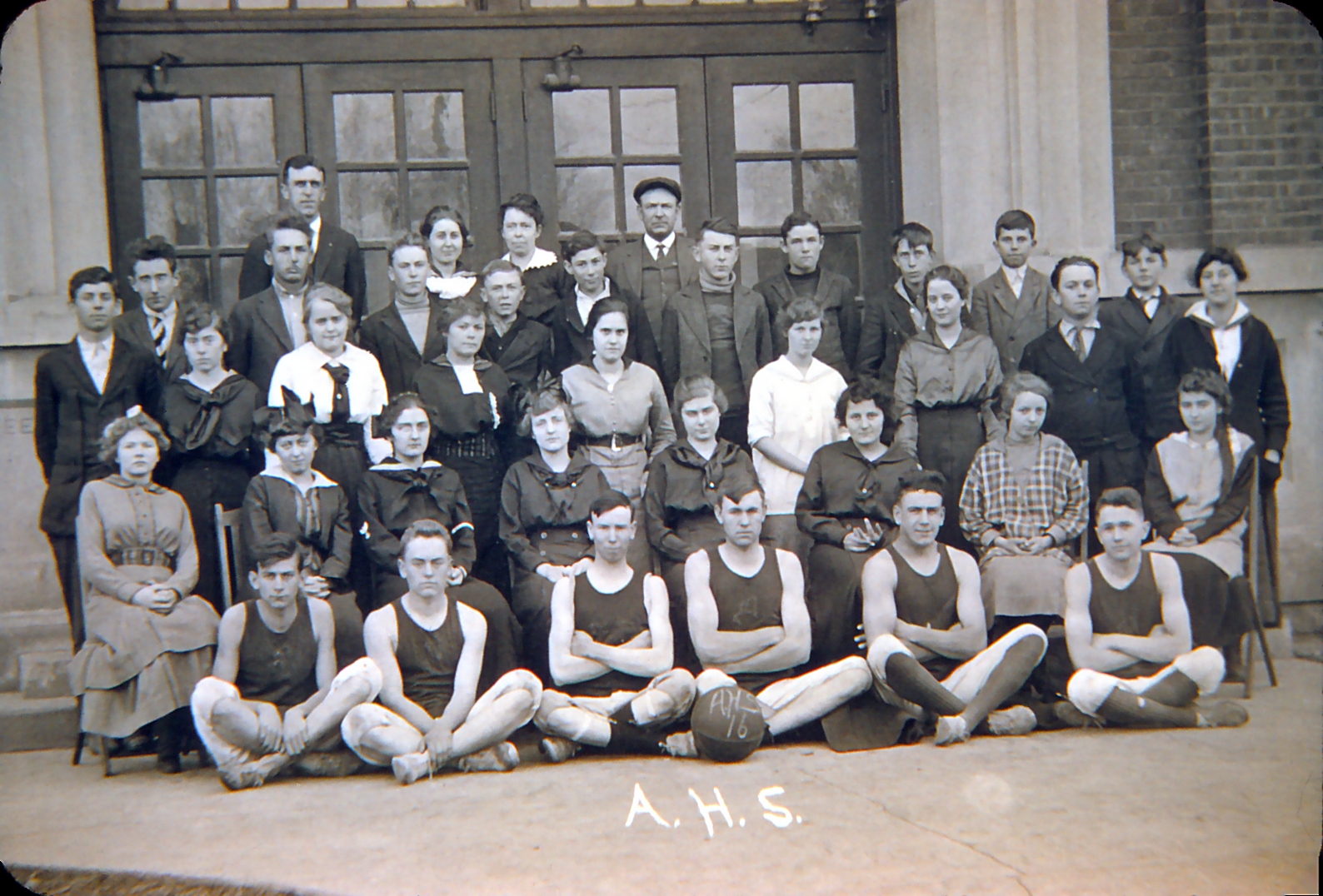 Clarence (2nd from left, sitting cross-legged)