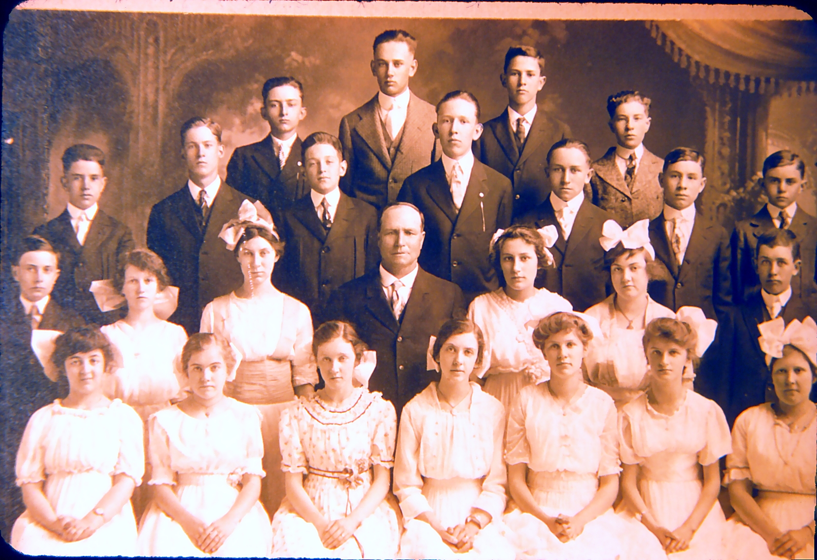 Hattie's 8th grade graduation — she's second from the left in the front row